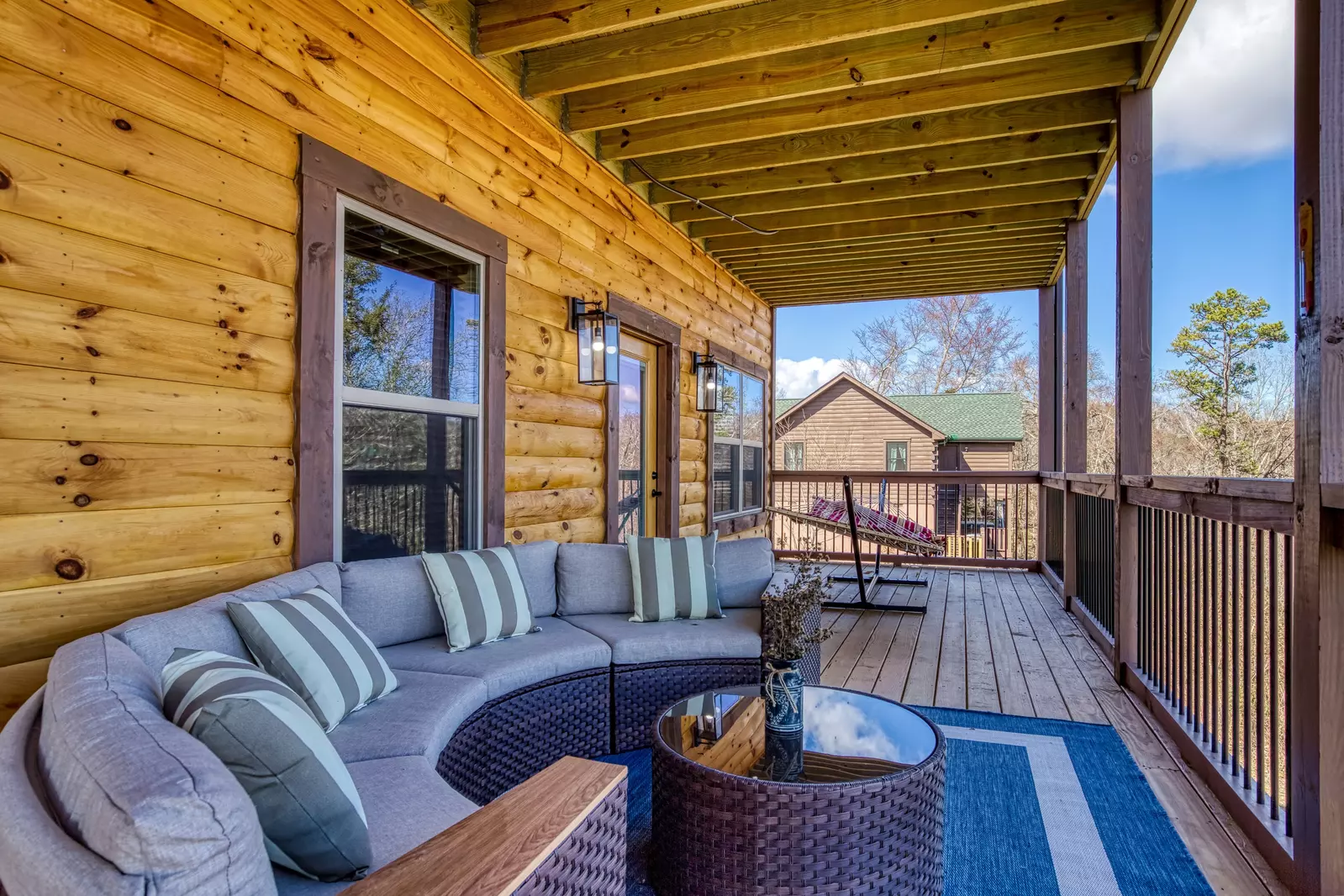 Cozy Cub Cabin main level deck with hammock