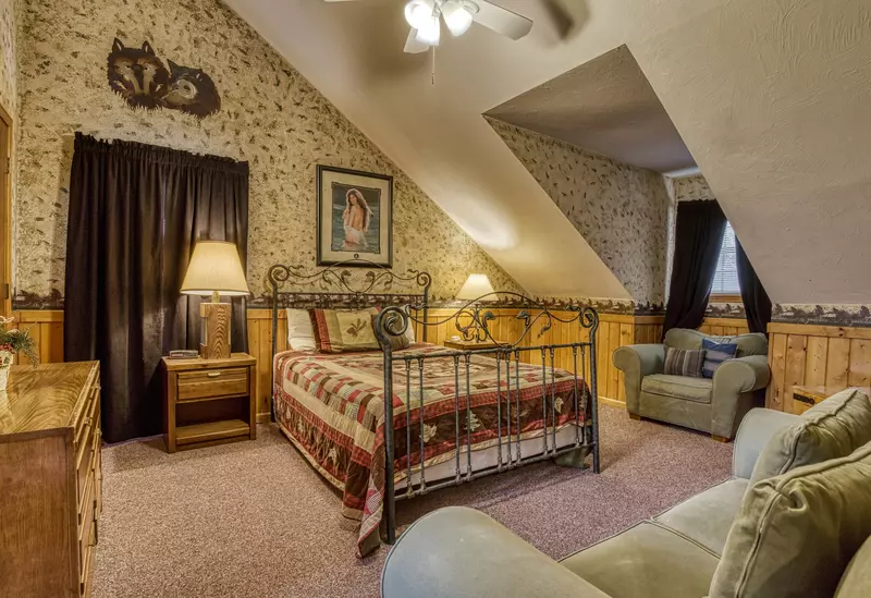 Dances With Wolves upper level bedroom with queen size bed