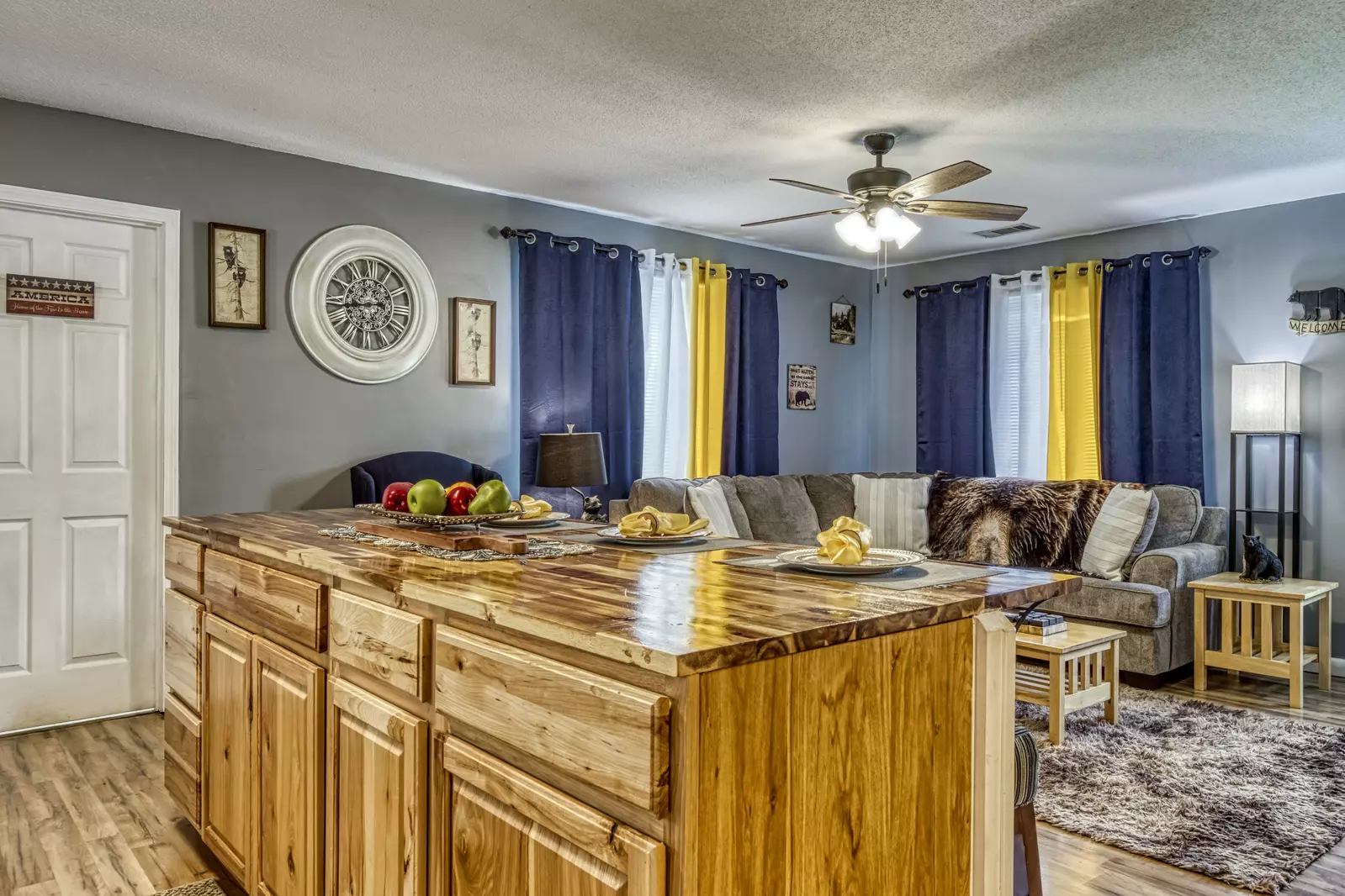 Four Bearoom Cottage kitchen island and living room 