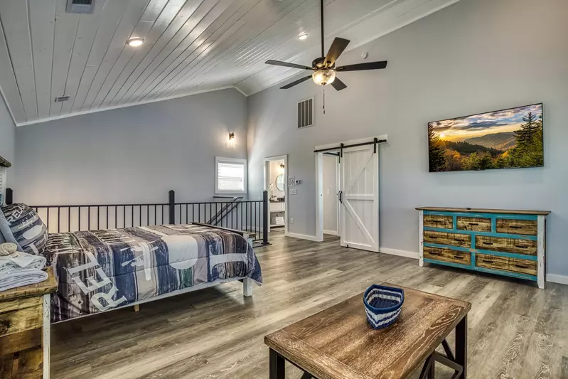 Lake View Therapy upper level loft area with 65 inch TV