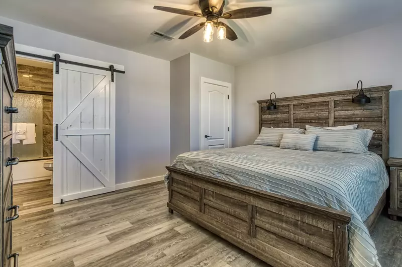 Lake View Therapy lower level bedroom with king size bed