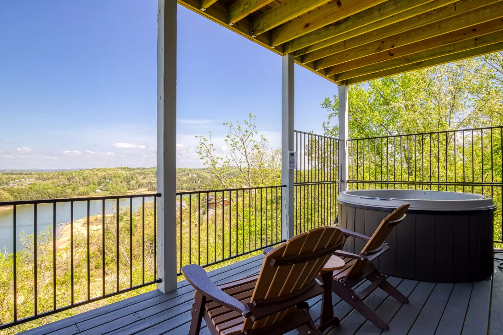 Lake View Therapy covered back deck with hot tub