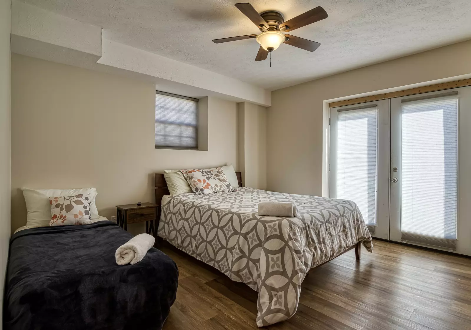 Magic Views lower level bedroom with full size and twin size bed