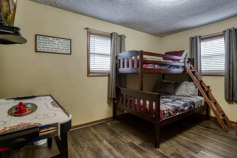 Moose Haven Cabin bedroom two with air hockey table