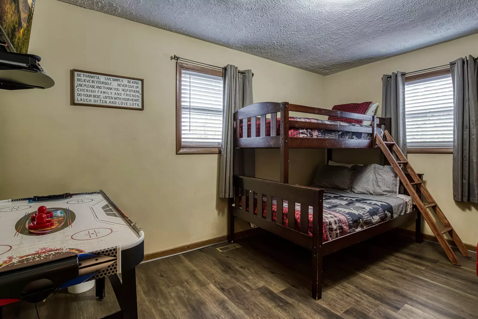 Moose Haven Cabin bedroom two with air hockey table