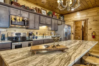 Mountown Moments Vista kitchen island and fully furnished kitchen