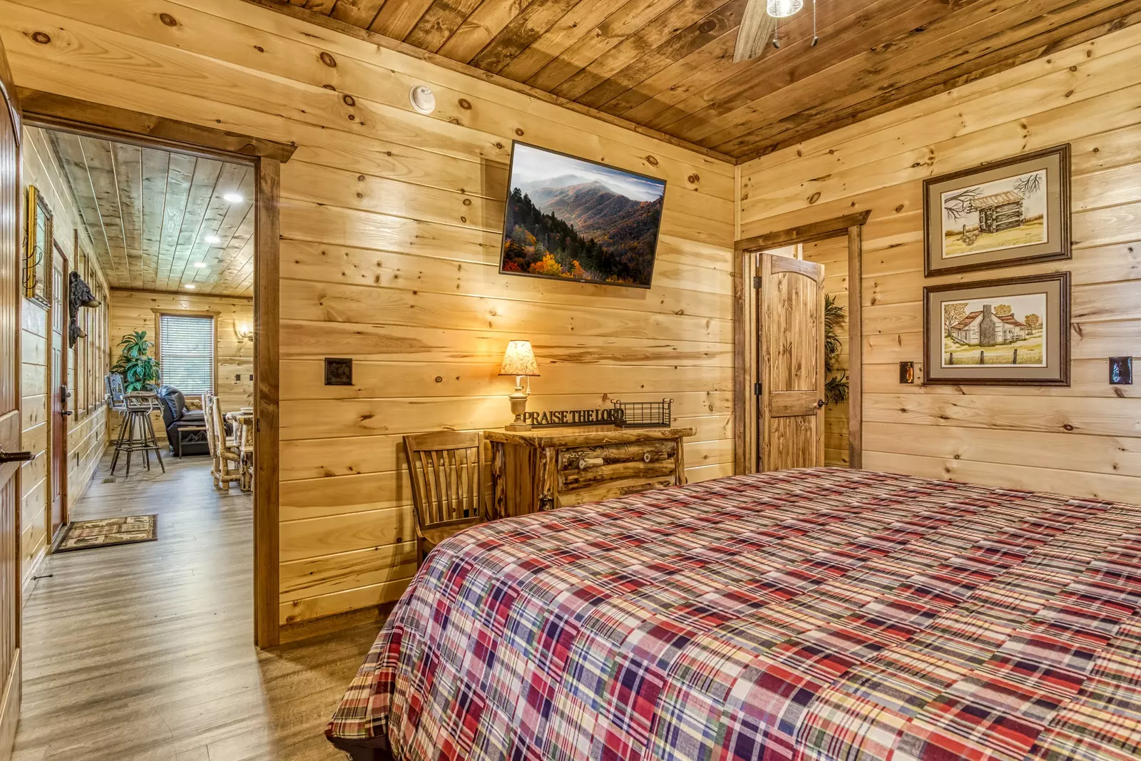 Mountown Moments Vista main level bedroom with king size bed and 50 inch TV
