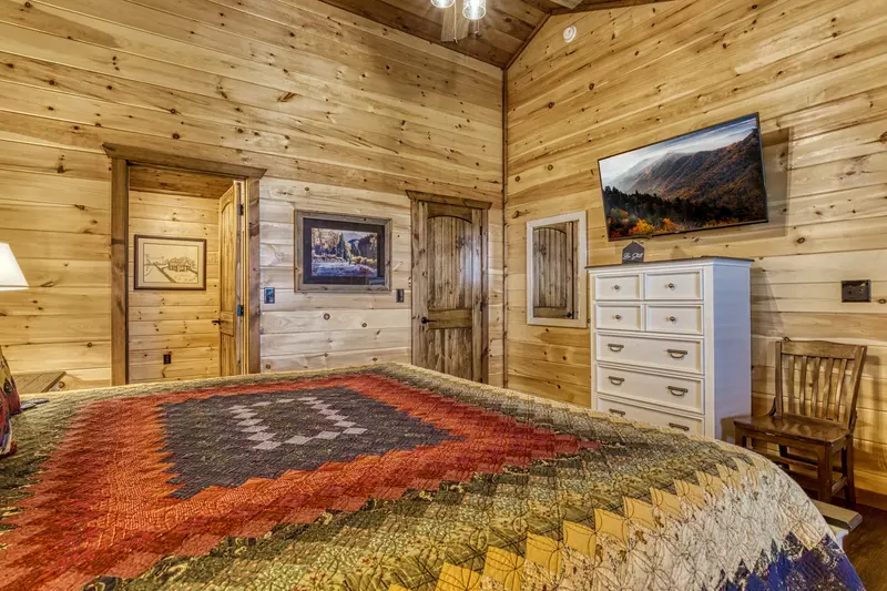 Mountown Moments Vista upper level bedroom two with king size bed and 50 inch TV