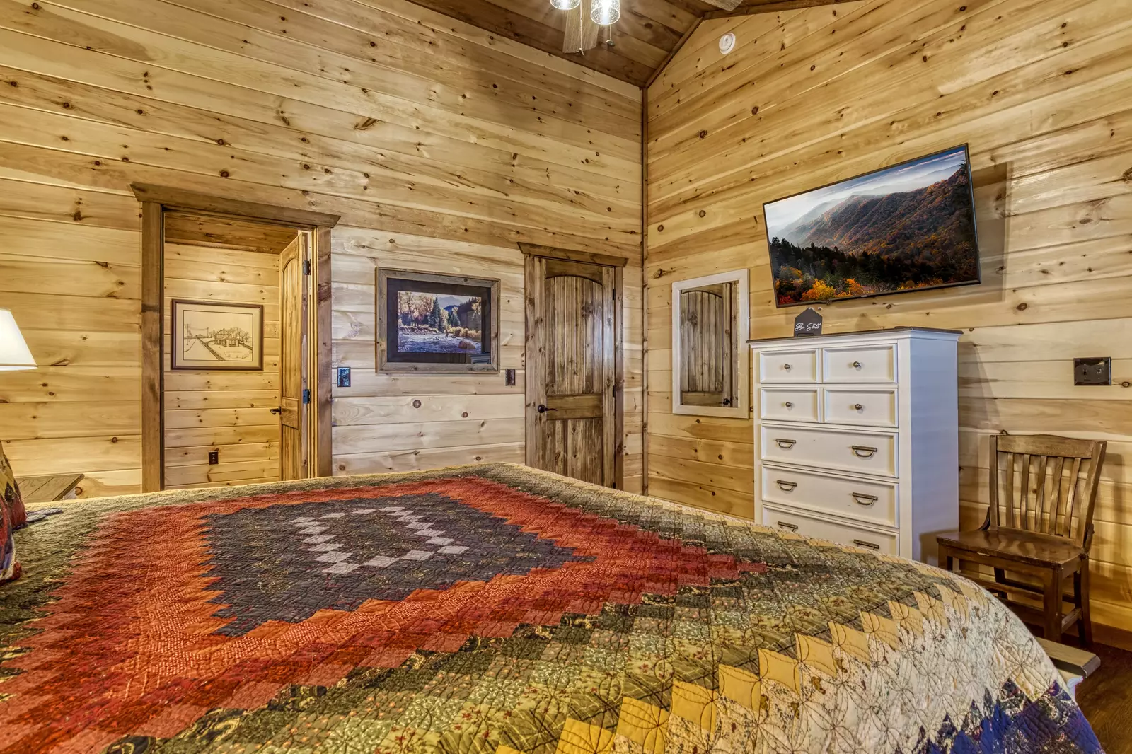 Mountown Moments Vista upper level bedroom two with king size bed and 50 inch TV