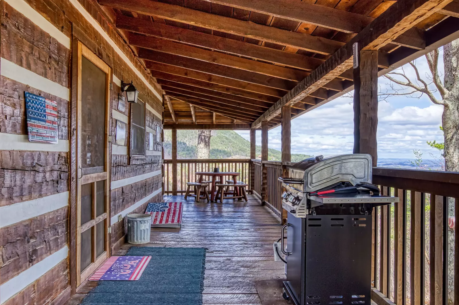 Old Glory covered deck with gas grill