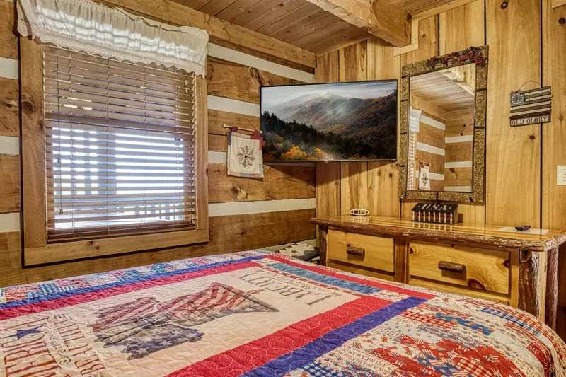 Old Glory main level bedroom with queen size bed
