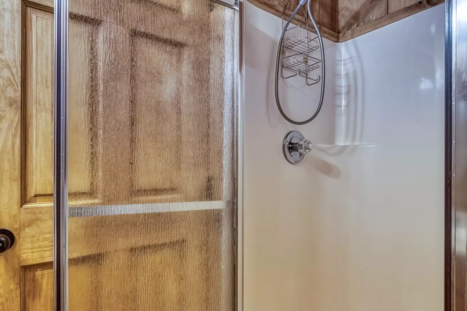 Old Glory loft area bathroom with walk in shower
