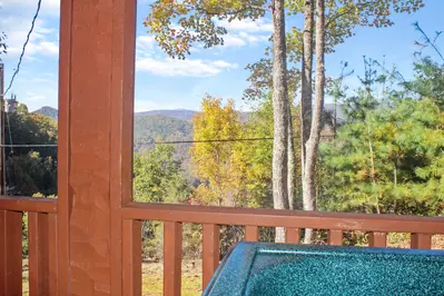 Pleasant View screened in deck with hot tub