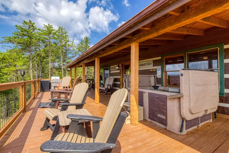 Secluded Summit front deck with hot tub and patio furniture 