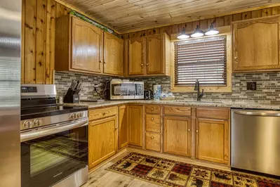 Lakeview fully furnished kitchen with stainless steel appliances