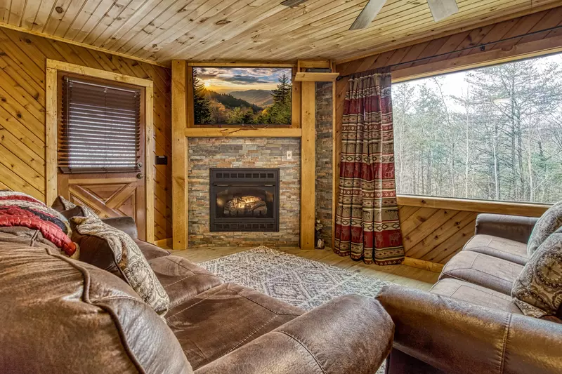 Lakeview living room with seasonal gas fireplace
