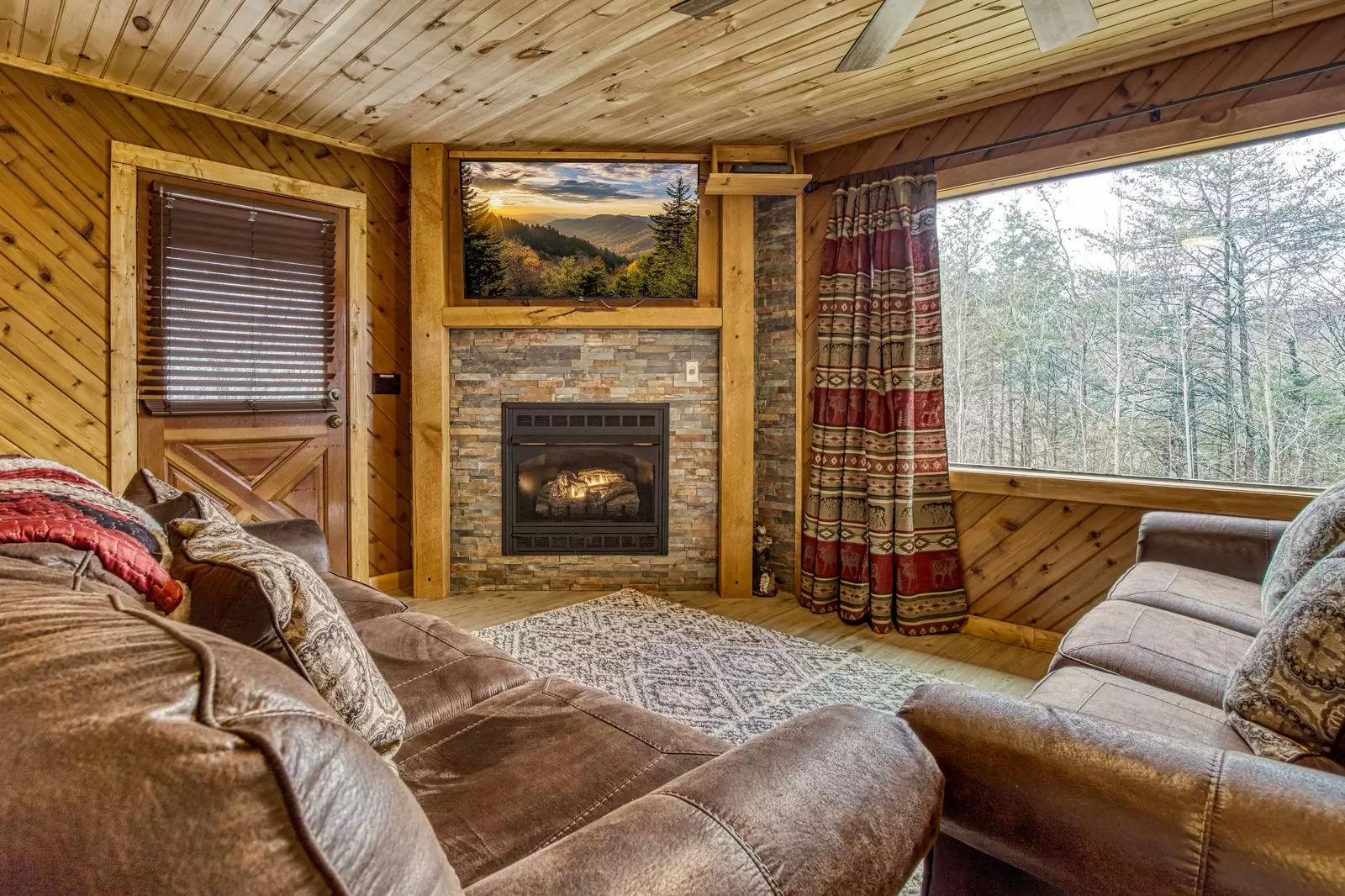 Lakeview living room with seasonal gas fireplace