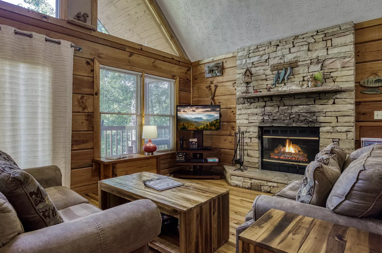 Squirrels Nest living room with wood burning fireplace