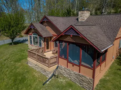 Sunset View Chalet screened in back deck with hot tub