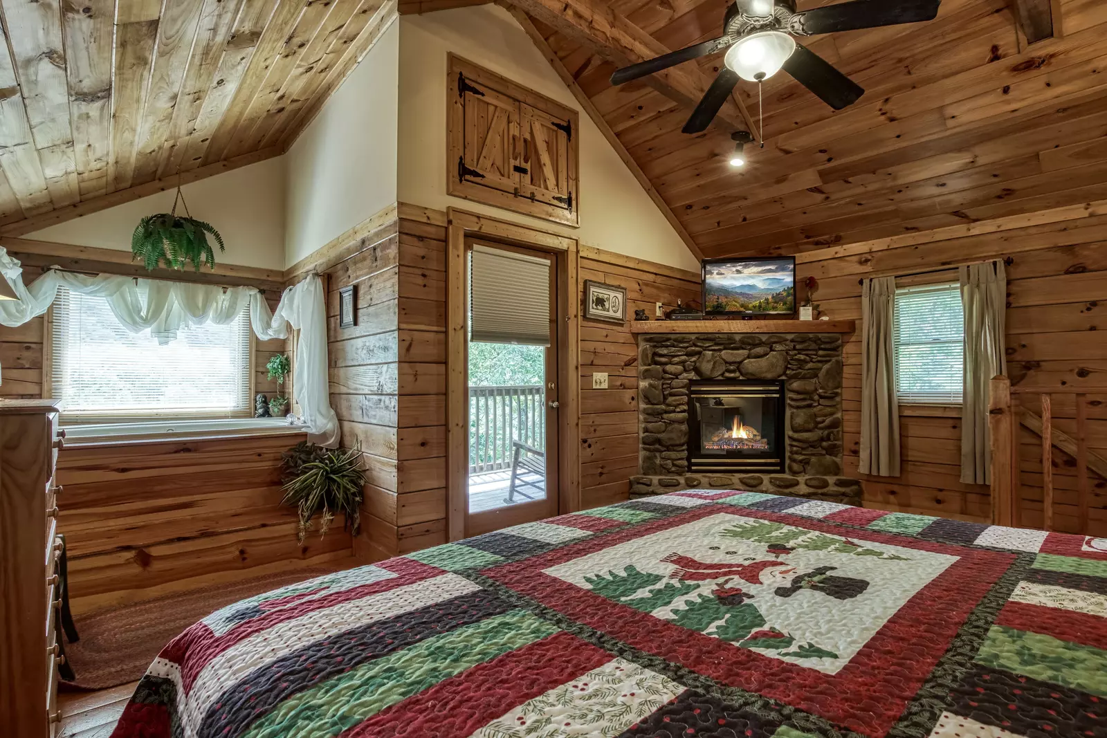 Tennessee Twilight Cabin upper level bedroom with gas fireplace