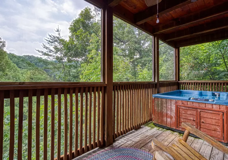 Tennessee Twilight Cabin covered back deck with hot tub