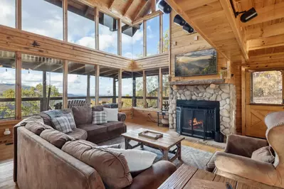 Take in the view from the cozy living room around the wood burning fireplace