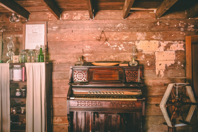 organ in an old cabin