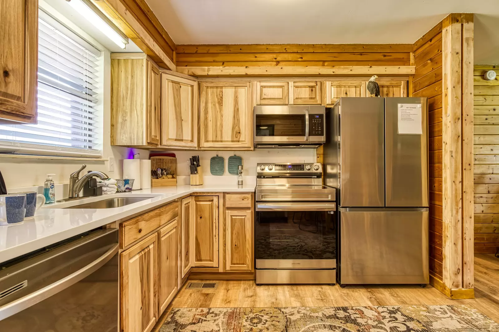 Happy Hollow Hideaway fully furnished kitchen with stainless steel appliances