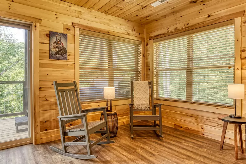 Mountain Memories lower level sitting area with rocking chairs