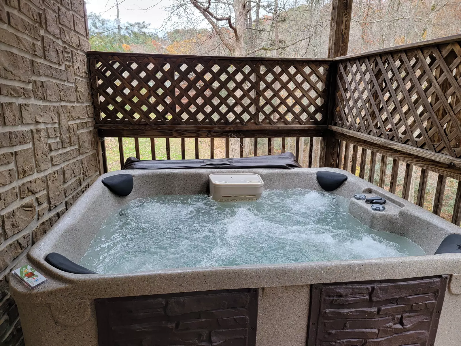 Relax in the bubbling hot tub on the lower deck