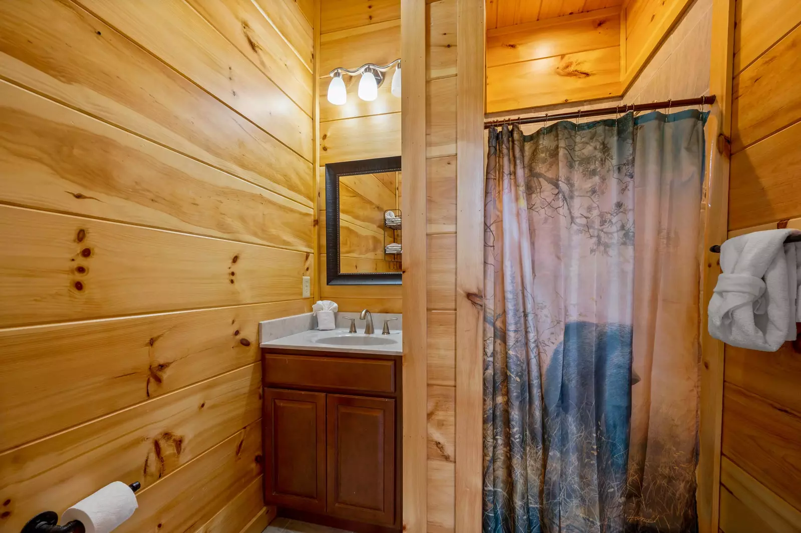 Upstairs bath connects to queen bunkbed bedroom and also the gameroom