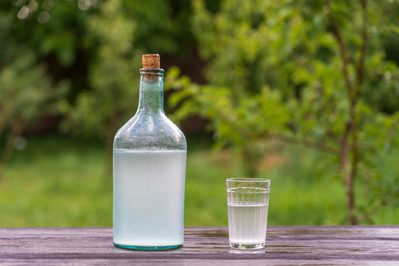 moonshine jug and glass