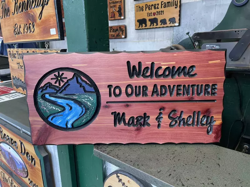 ebd70af89e5e-custom_carved_wooden_sign