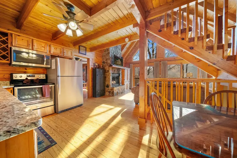 Seating for 6-8, plus an additional table and chairs in a nearby closet.