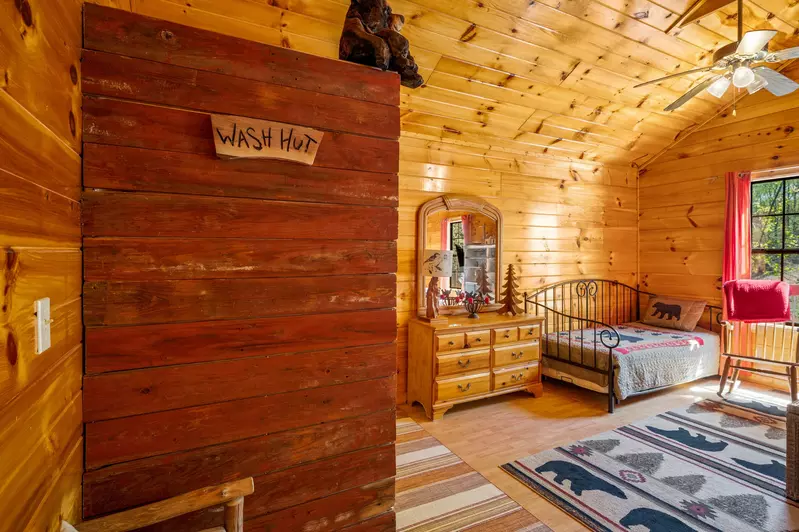 Permanent Vacation, a cozy 1-bedroom cabin tucked in the woods of Sevierville. Guests love its quiet, private setting—perfect for honeymoons, anniversaries, or small family getaways. Just 8 miles from the Parkway in Pigeon Forge, you’ll enjoy the best of both worlds: peaceful seclusion and easy access to the Smoky Mountains’ best attractions.