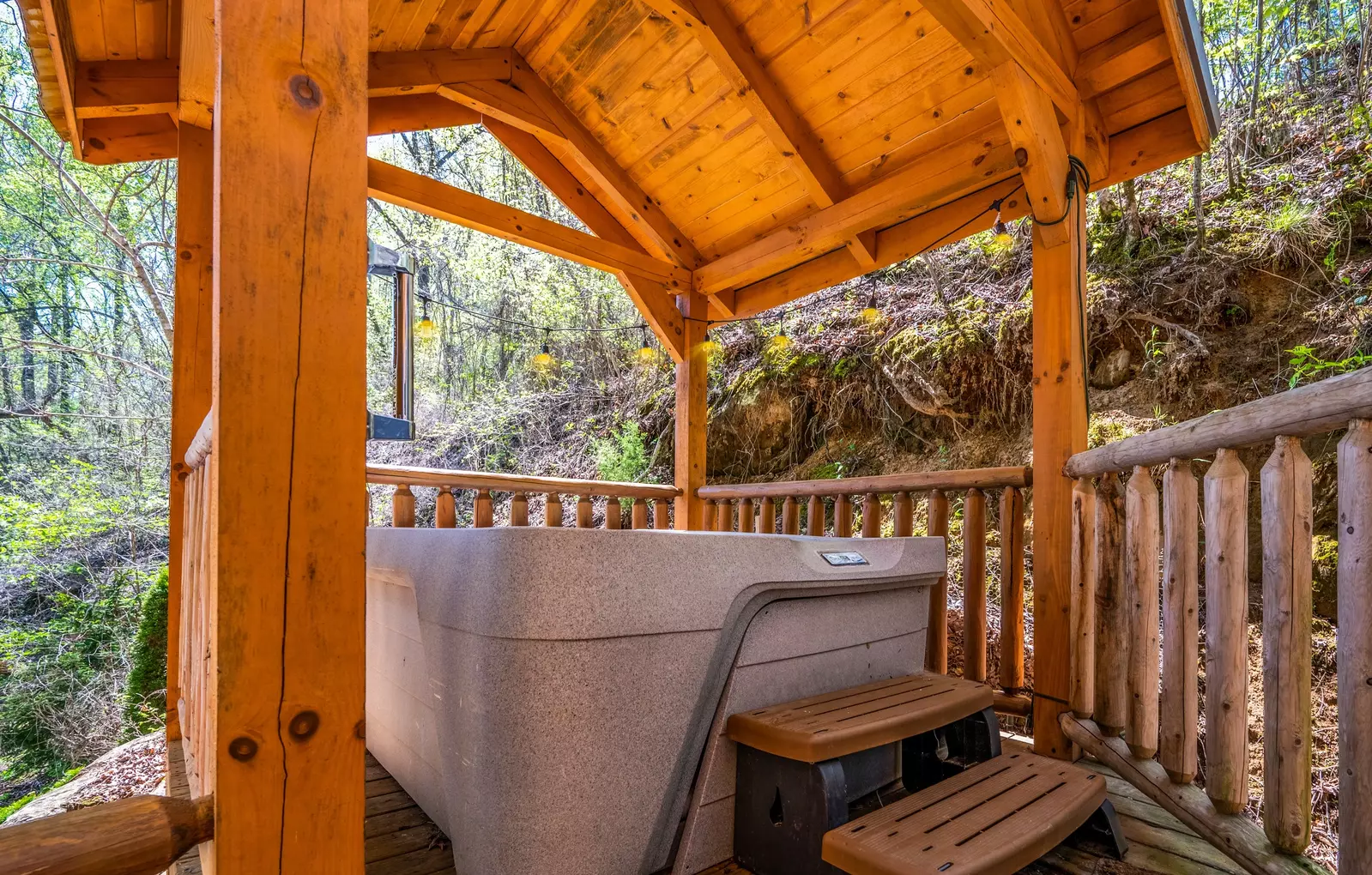 Permanent Vacation, a cozy 1-bedroom cabin tucked in the woods of Sevierville. Guests love its quiet, private setting—perfect for honeymoons, anniversaries, or small family getaways. Just 8 miles from the Parkway in Pigeon Forge, you’ll enjoy the best of both worlds: peaceful seclusion and easy access to the Smoky Mountains’ best attractions.