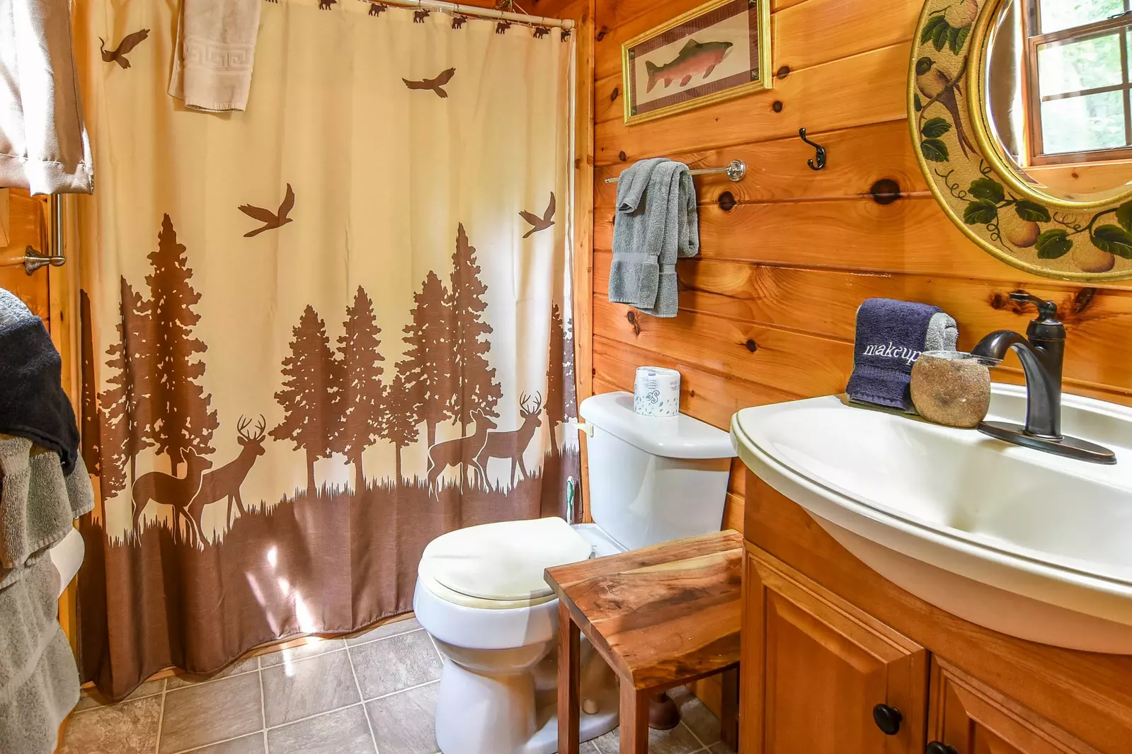 Permanent Vacation, a cozy 1-bedroom cabin tucked in the woods of Sevierville. Guests love its quiet, private setting—perfect for honeymoons, anniversaries, or small family getaways. Just 8 miles from the Parkway in Pigeon Forge, you’ll enjoy the best of both worlds: peaceful seclusion and easy access to the Smoky Mountains’ best attractions.