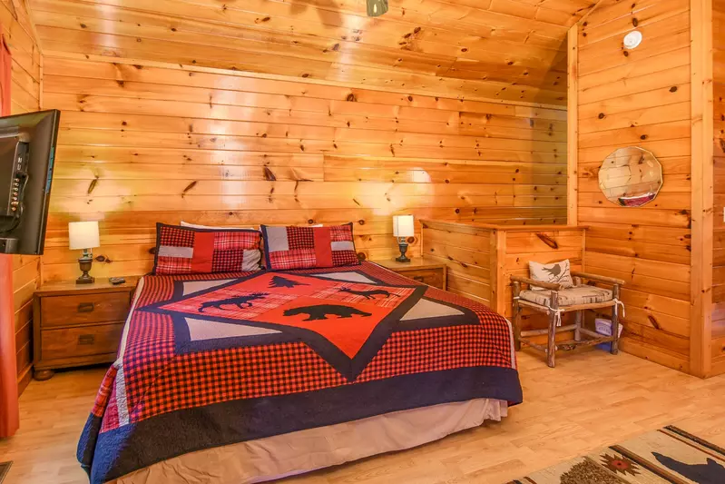 Permanent Vacation, a cozy 1-bedroom cabin tucked in the woods of Sevierville. Guests love its quiet, private setting—perfect for honeymoons, anniversaries, or small family getaways. Just 8 miles from the Parkway in Pigeon Forge, you’ll enjoy the best of both worlds: peaceful seclusion and easy access to the Smoky Mountains’ best attractions.