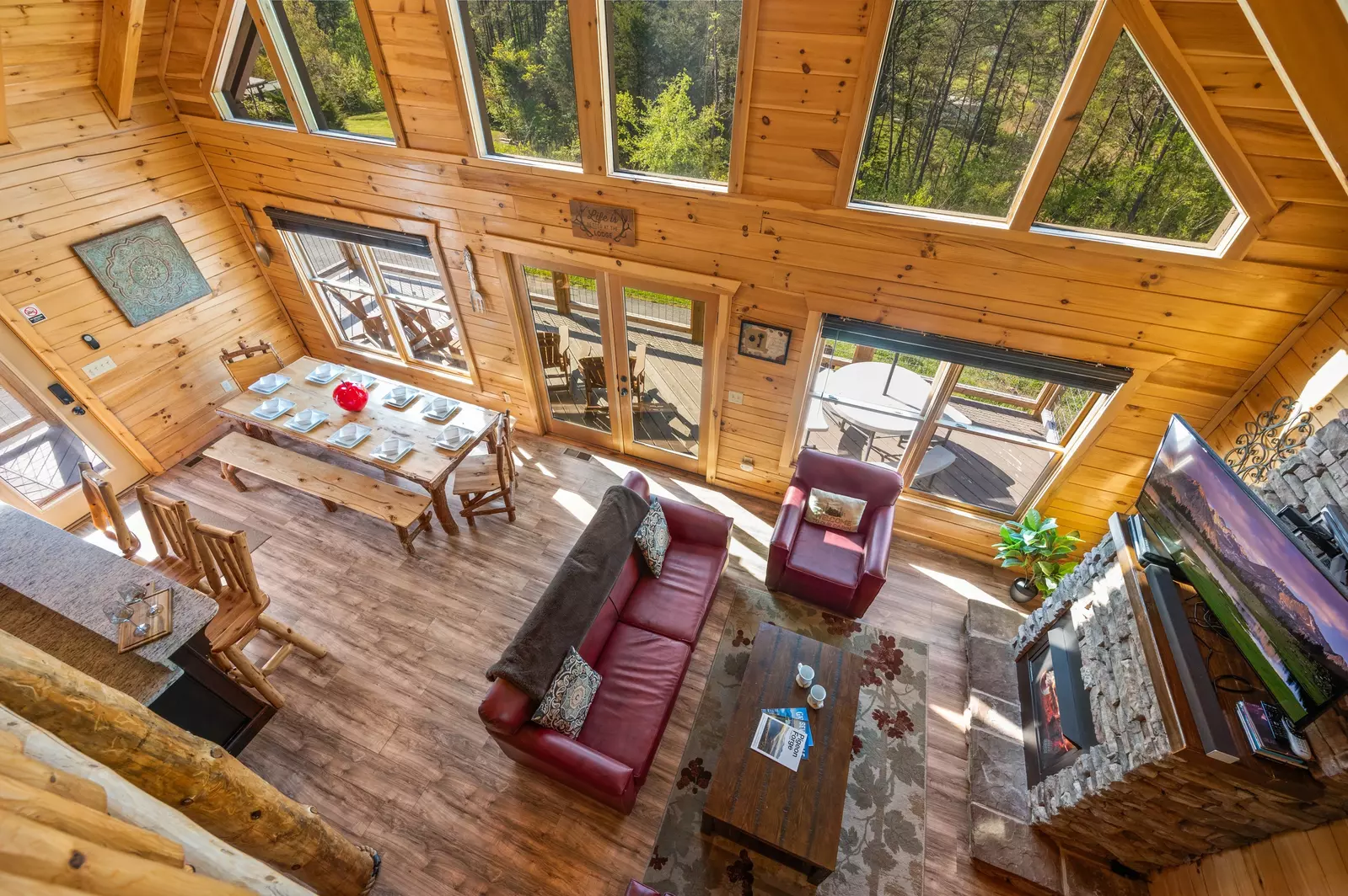 Nothin’ But a Good Time – a spacious 4-bedroom Smoky Mountain cabin rental in Sevierville featuring king bedrooms, twin bunks, hot tub, theater room, fire pit, and cozy mountain views.