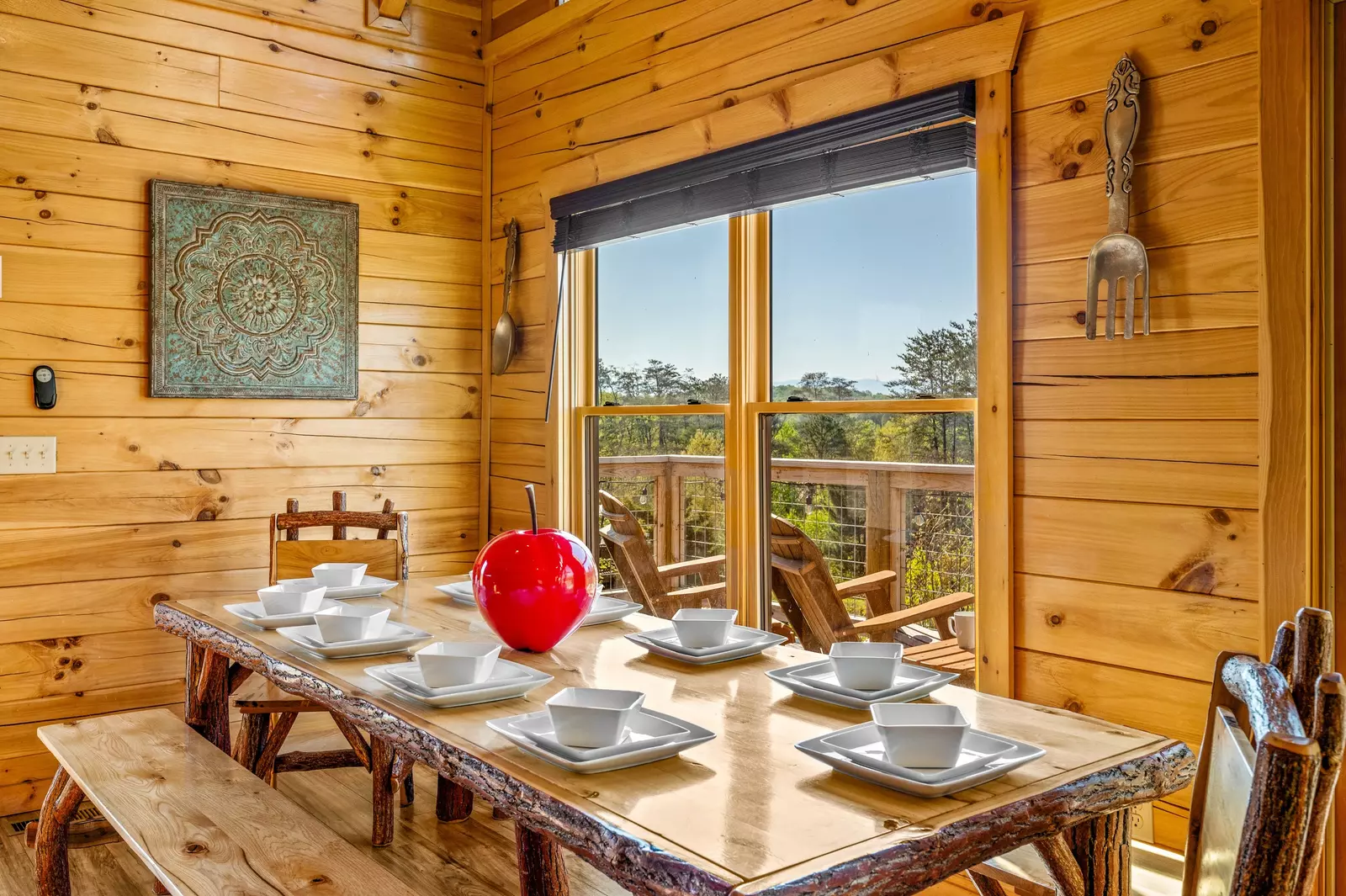 Nothin’ But a Good Time – a spacious 4-bedroom Smoky Mountain cabin rental in Sevierville featuring king bedrooms, twin bunks, hot tub, theater room, fire pit, and cozy mountain views.