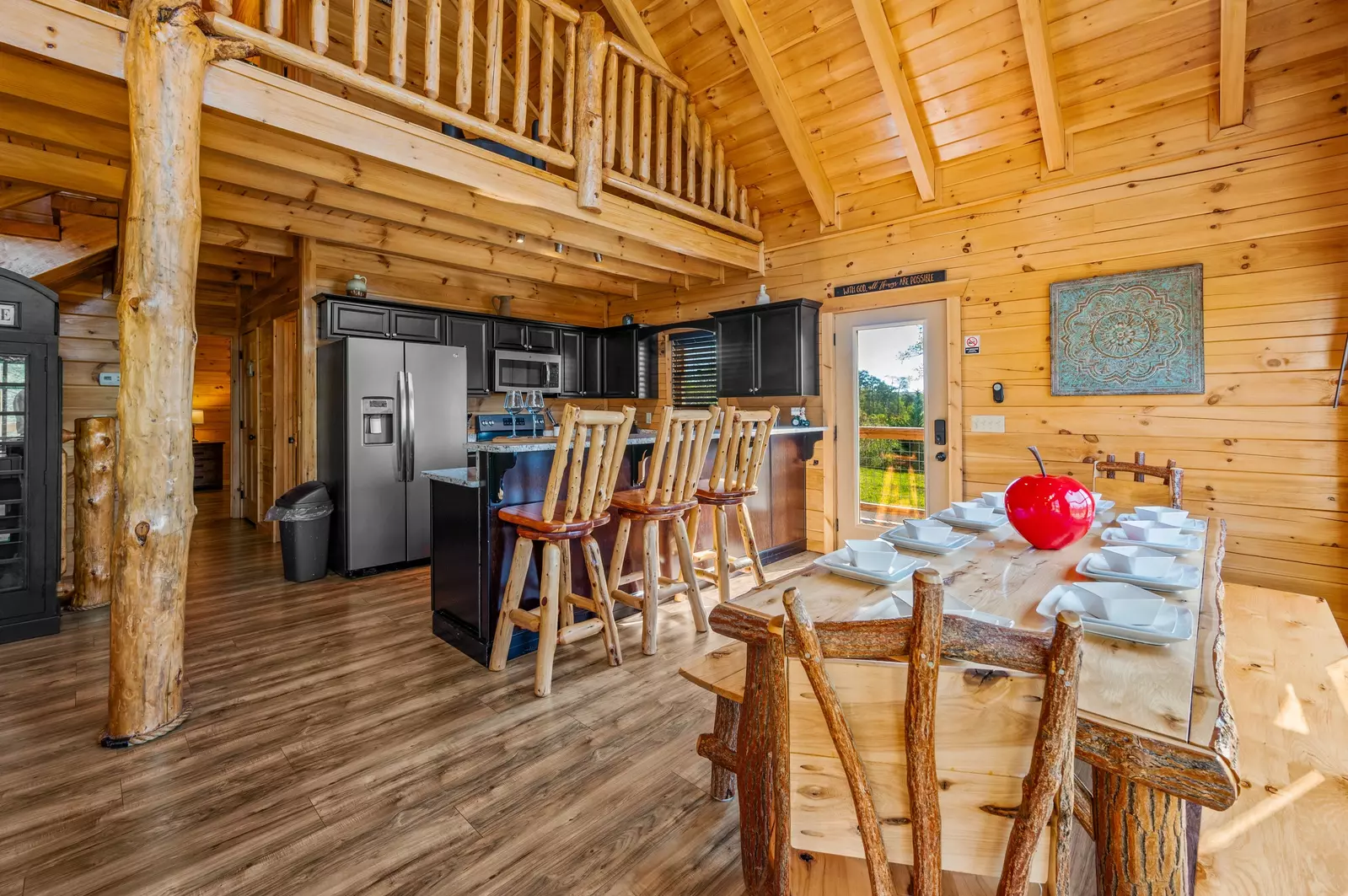 Nothin’ But a Good Time – a spacious 4-bedroom Smoky Mountain cabin rental in Sevierville featuring king bedrooms, twin bunks, hot tub, theater room, fire pit, and cozy mountain views.