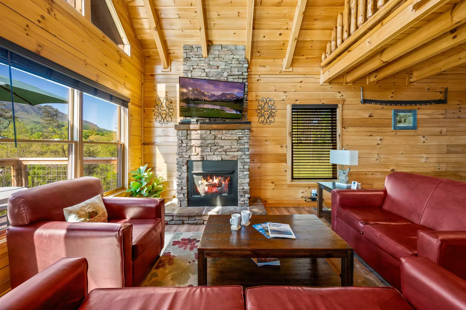 Nothin’ But a Good Time – a spacious 4-bedroom Smoky Mountain cabin rental in Sevierville featuring king bedrooms, twin bunks, hot tub, theater room, fire pit, and cozy mountain views.