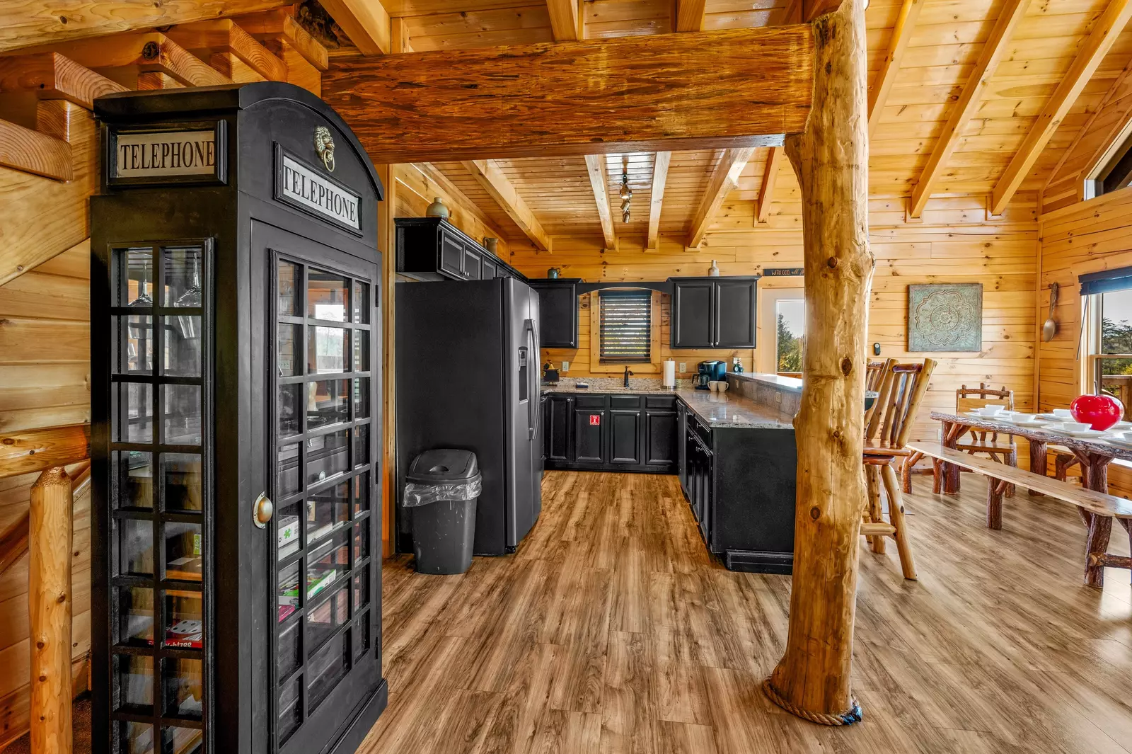Nothin’ But a Good Time – a spacious 4-bedroom Smoky Mountain cabin rental in Sevierville featuring king bedrooms, twin bunks, hot tub, theater room, fire pit, and cozy mountain views.