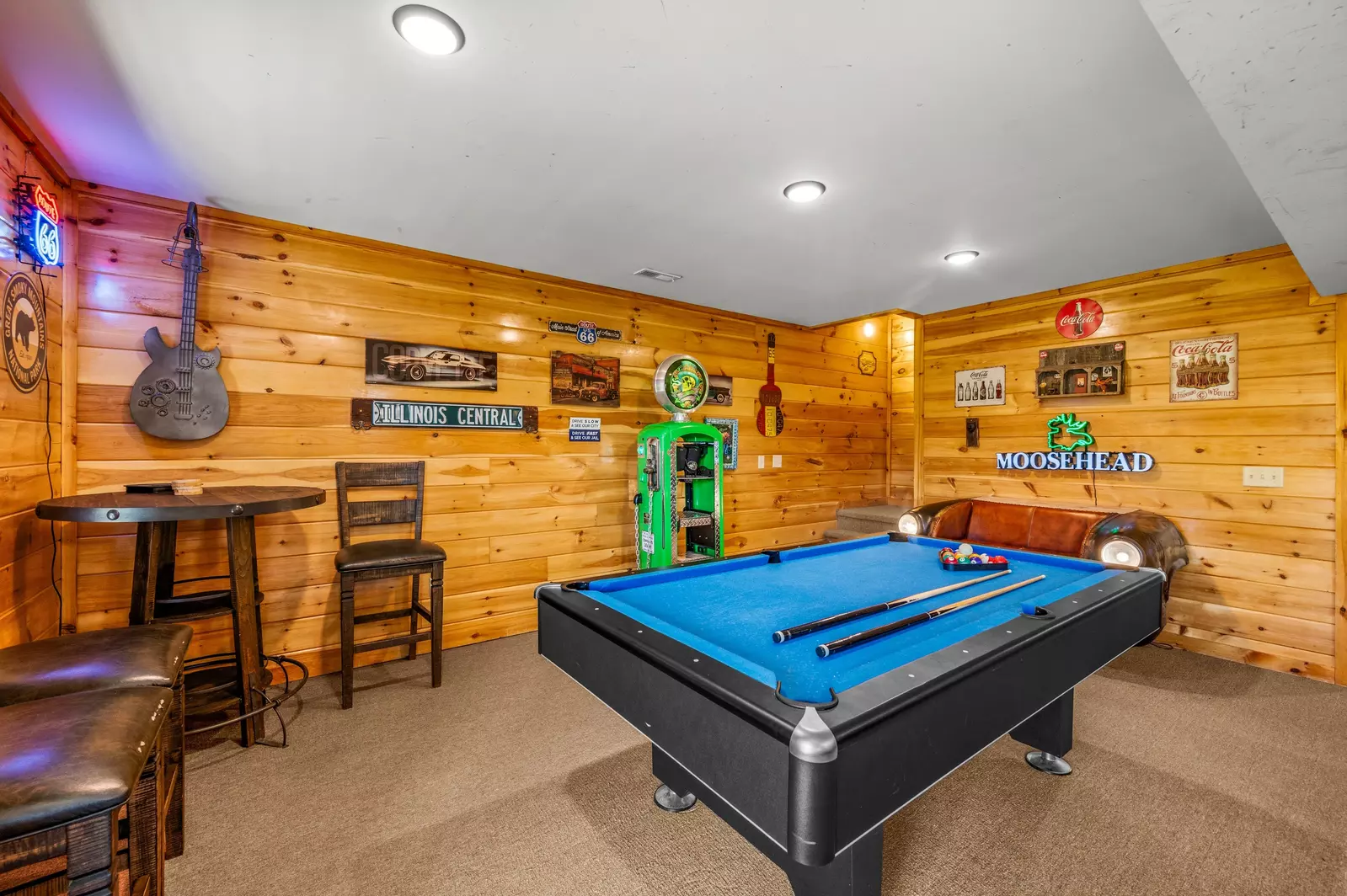 Nothin’ But a Good Time – a spacious 4-bedroom Smoky Mountain cabin rental in Sevierville featuring king bedrooms, twin bunks, hot tub, theater room, fire pit, and cozy mountain views.