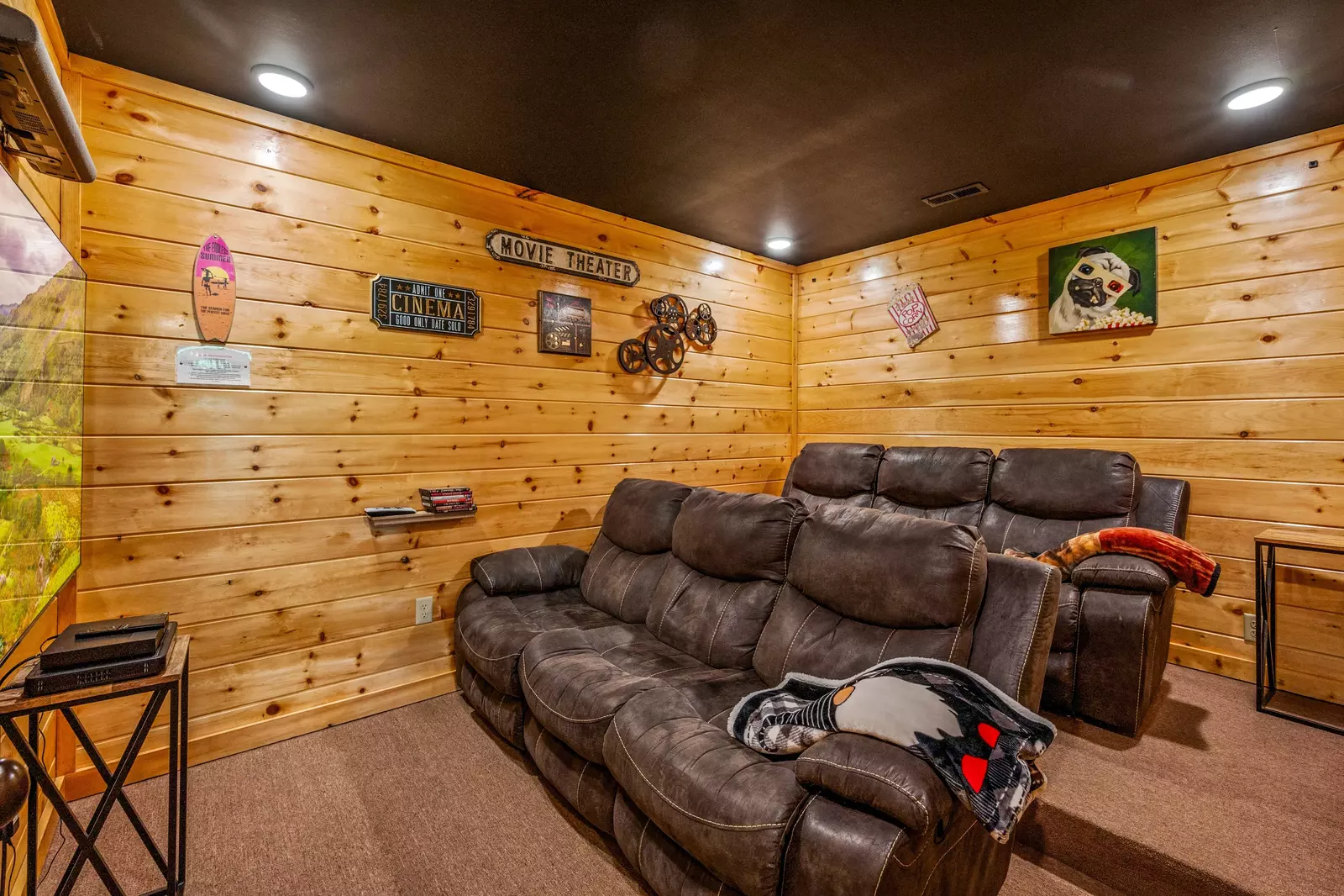 Nothin’ But a Good Time – a spacious 4-bedroom Smoky Mountain cabin rental in Sevierville featuring king bedrooms, twin bunks, hot tub, theater room, fire pit, and cozy mountain views.