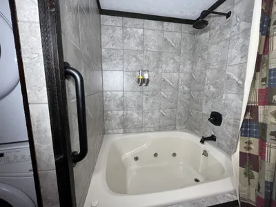 Bathe with the rain shower gently washing your troubles away.