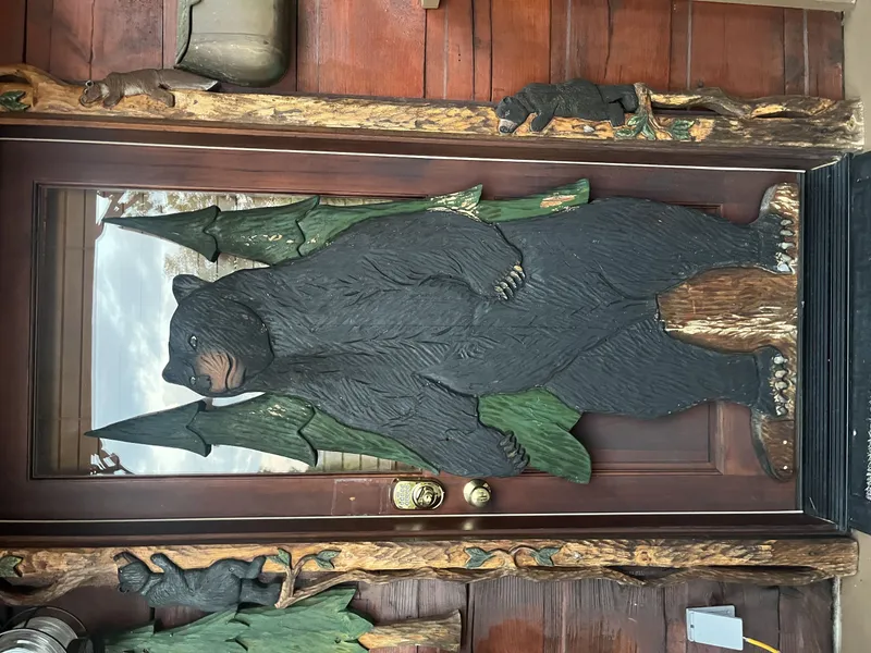 This woodthe first one to great you upon arriving. bear is