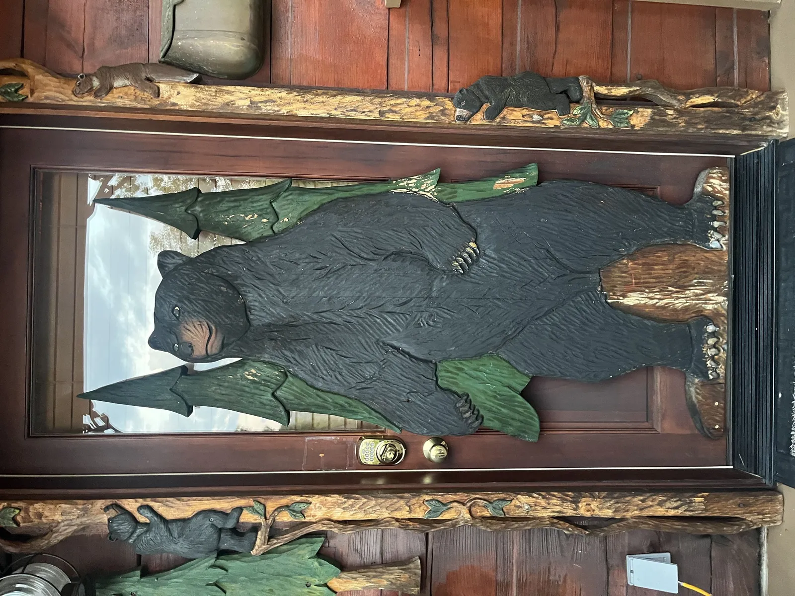 This woodthe first one to great you upon arriving. bear is