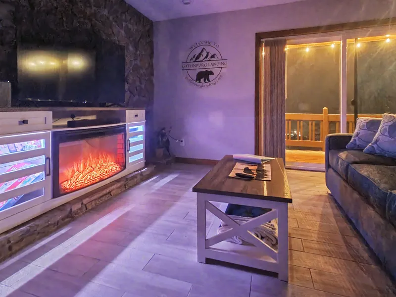 Night ambiance with the electric fireplace and deck lighting