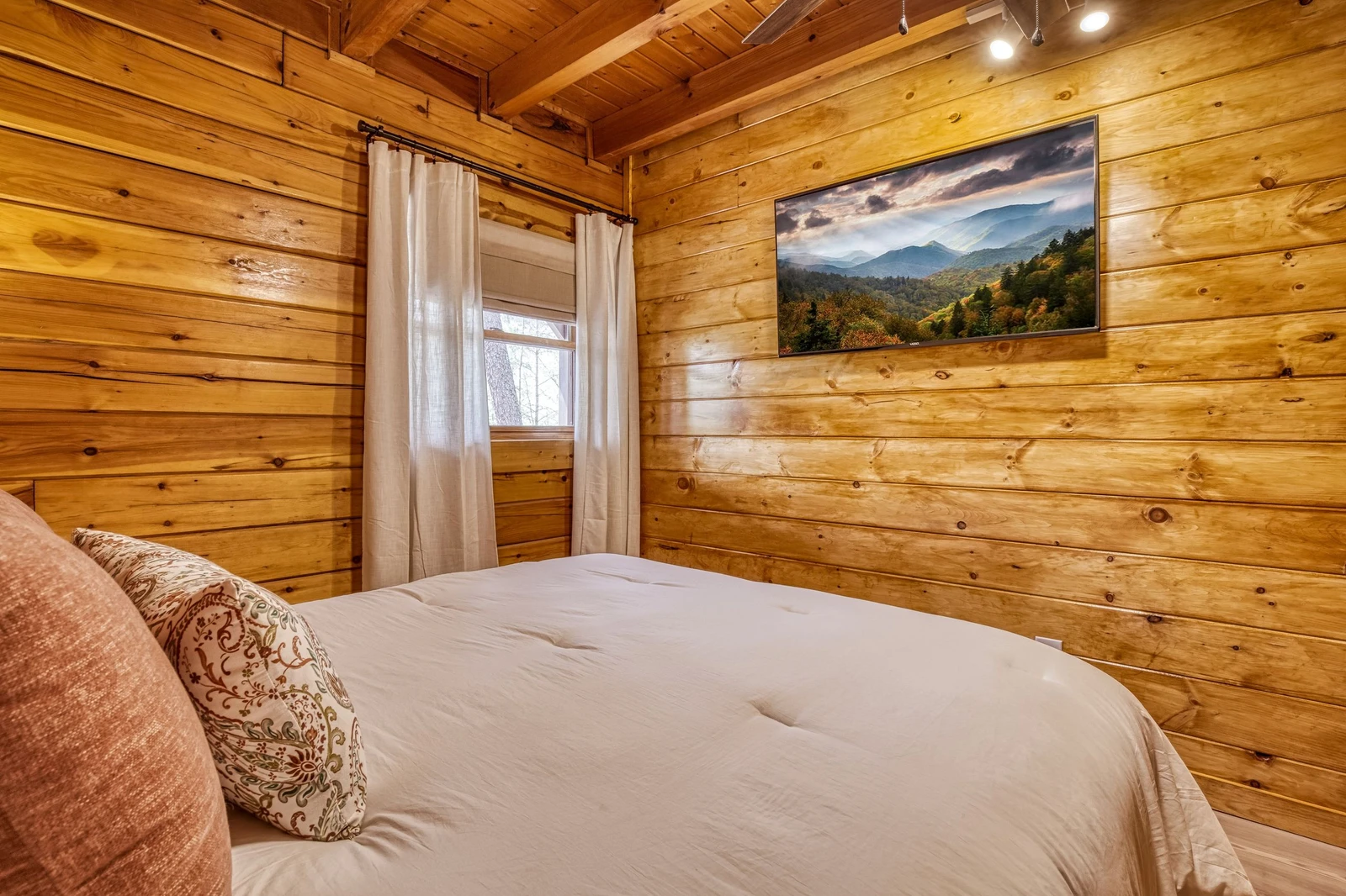 Sweet Dreams main level bedroom with 50 inch TV